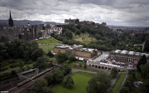 Image aerial view of green trees and buildings during daytime