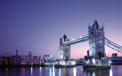 Image bridge over river during night time