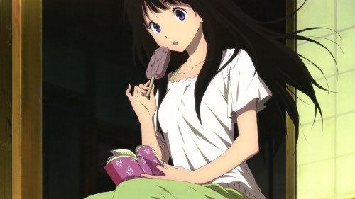 Image girl in white shirt holding ice cream