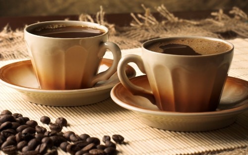 Image white ceramic mug on brown wooden table