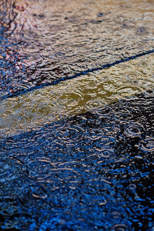 Image water droplets on blue and pink textile