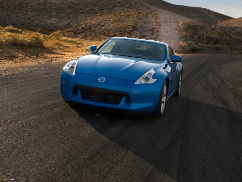 Image blue porsche 911 on road during daytime