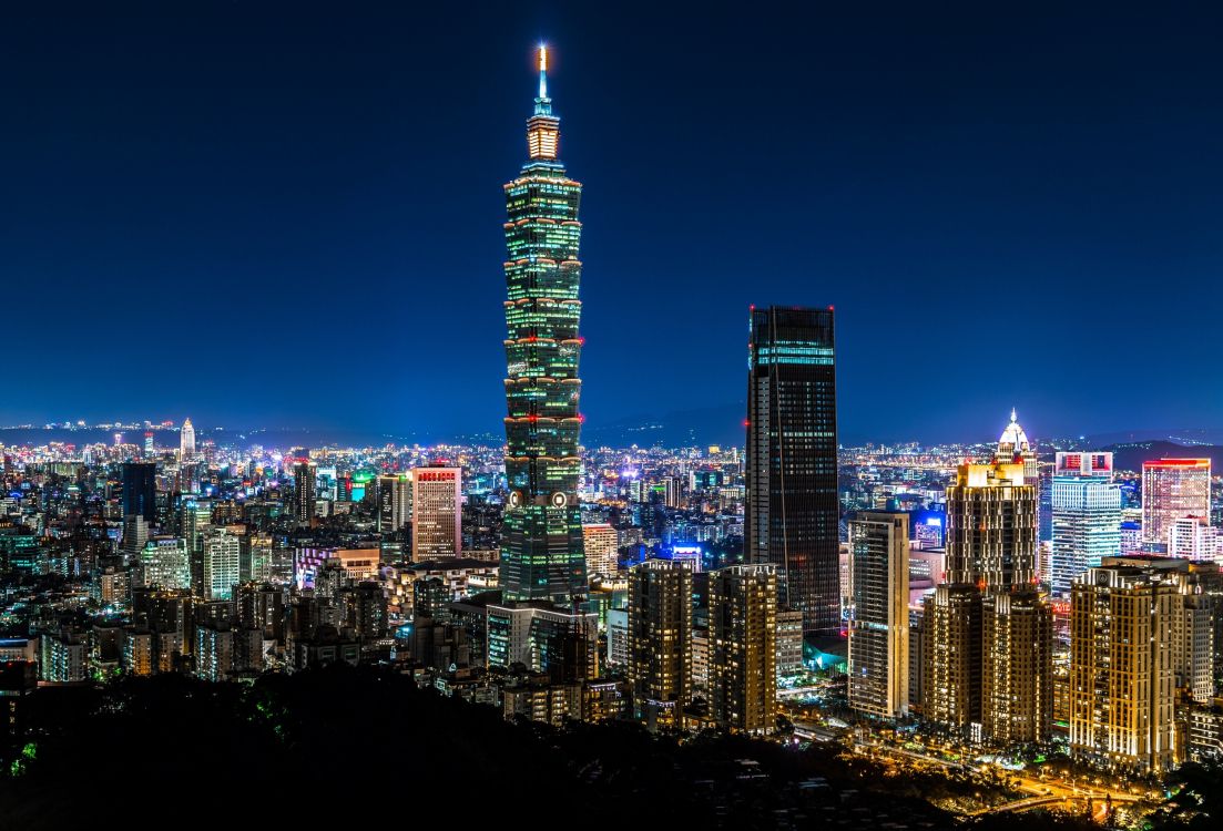 city skyline during night time