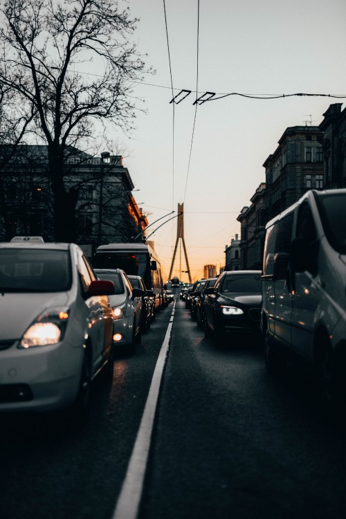 Image cars parked on the side of the road during daytime