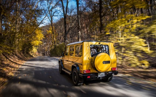 Image yellow van on road during daytime