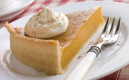 Image bread with white cream on white ceramic plate