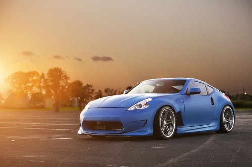 Image blue porsche 911 on road during daytime