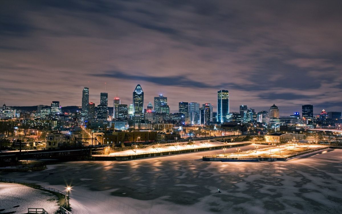 city skyline during night time