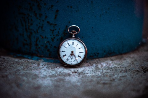 Image silver pocket watch at 10 00