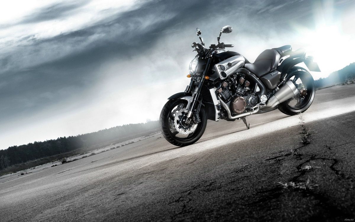 black and silver cruiser motorcycle on road during daytime