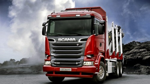 Image red and white ford truck on road during daytime