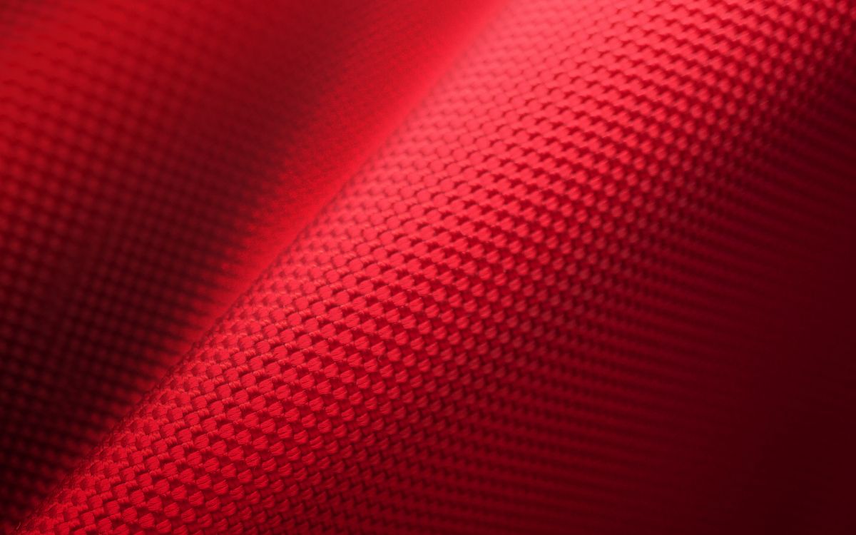 red textile in close up photography