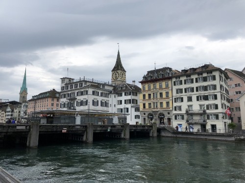 Image along the river, water, waterway, channel, city