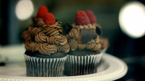 Image chocolate cupcake with strawberry on top