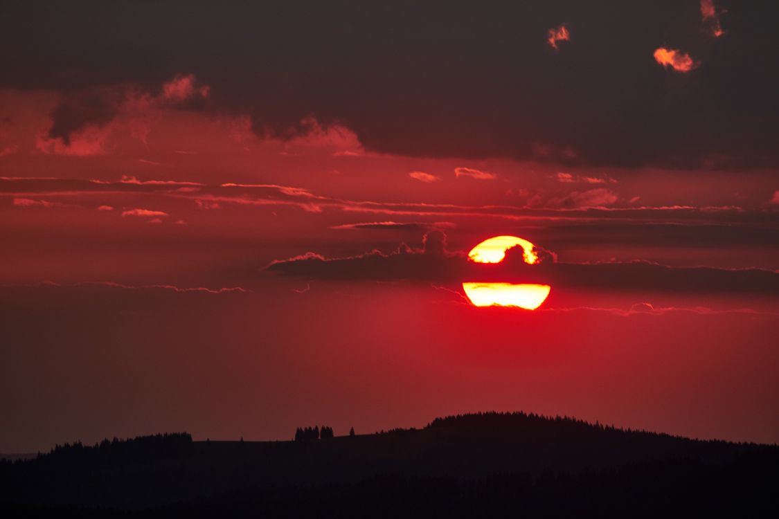 silhouette of mountain during sunset