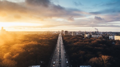 Image aerial view of city during sunset