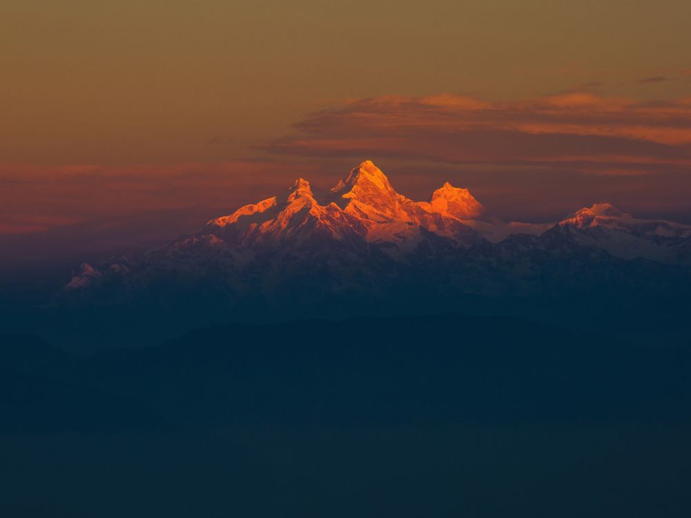 silhouette of mountain during sunset