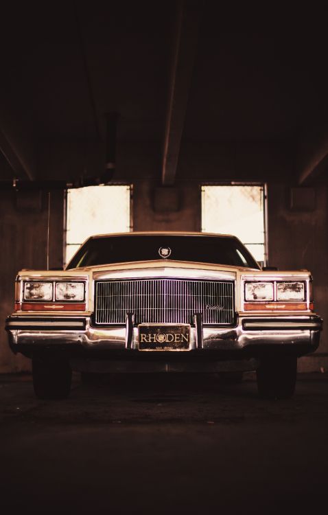 Classic Brown Car in a Garage. Wallpaper in 3493x5472 Resolution