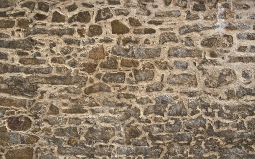 Image brown and black brick wall