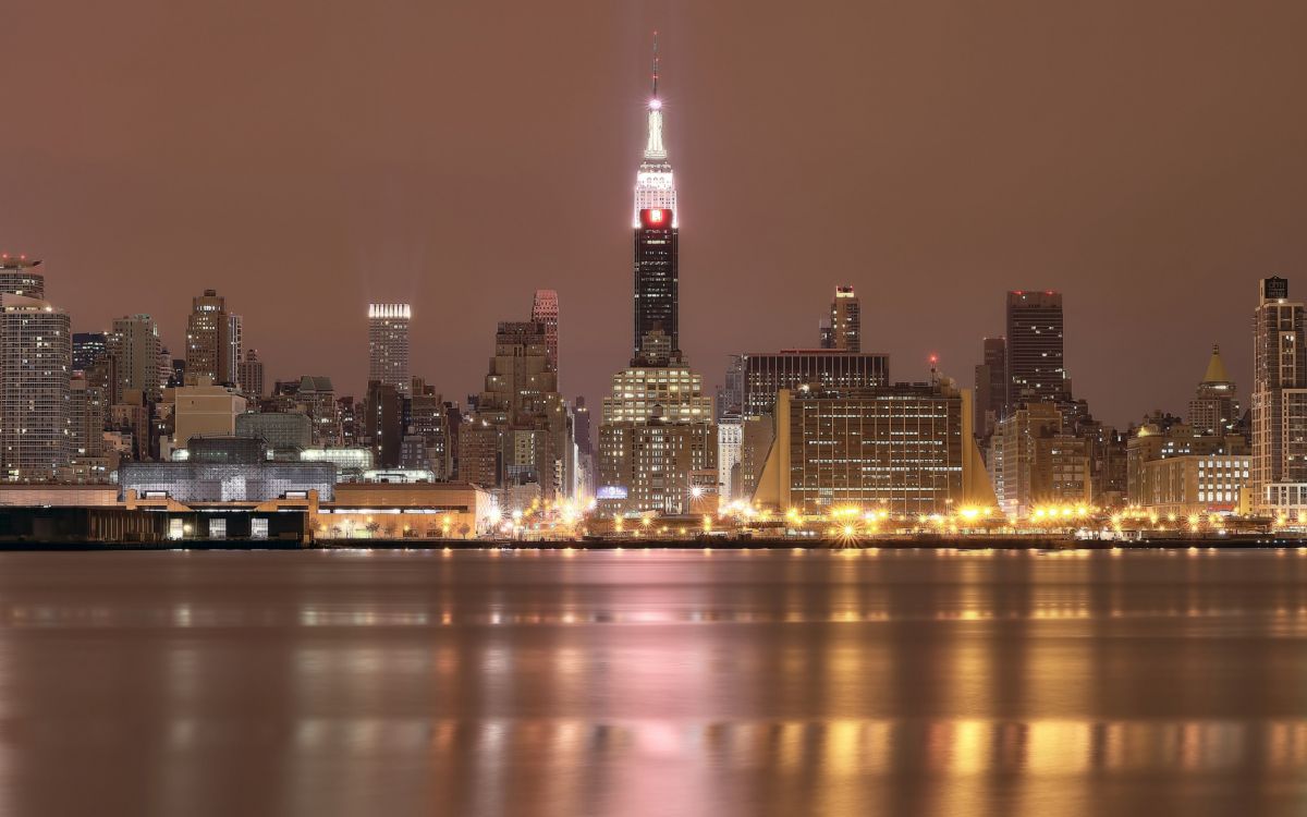 city skyline during night time