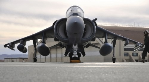 Image black fighter plane on airport during daytime