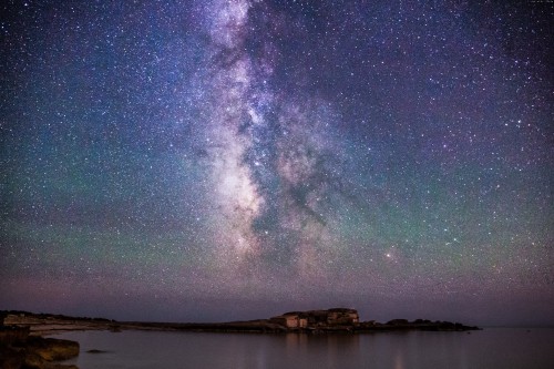 Image body of water under starry night