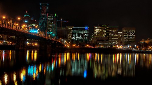 Image bridge over water during night time