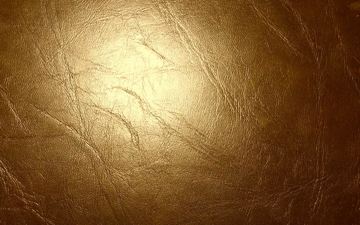 brown leather textile in close up photography