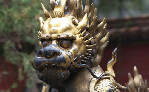 Image gold dragon statue during daytime