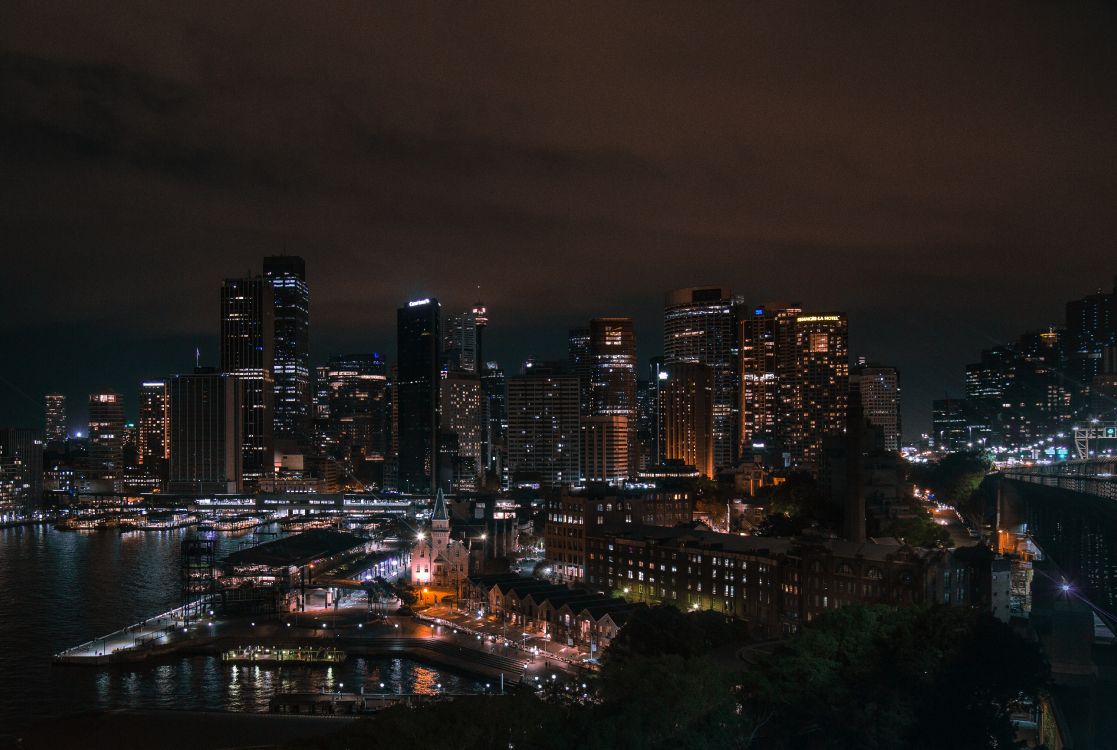 city skyline during night time