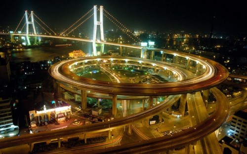 Image time lapse photography of cars on road during night time