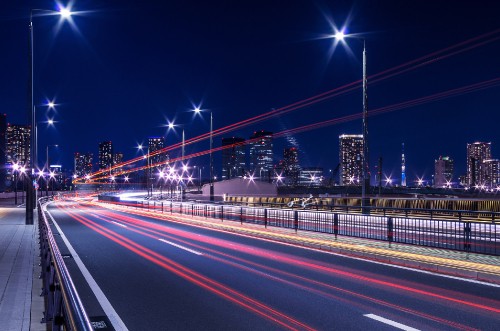 Image time lapse photography of cars on road during night time