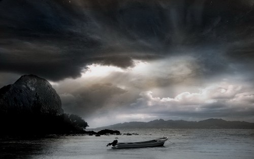 Image white boat on water under cloudy sky