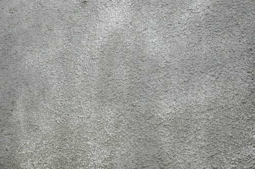 Image person in black shoes standing on gray carpet