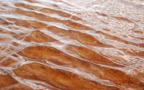 Image brown and white water waves