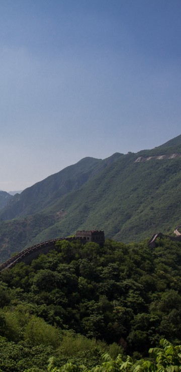 Image green mountains under blue sky during daytime