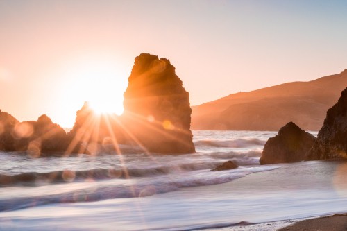 Image brown rock formation on sea during daytime