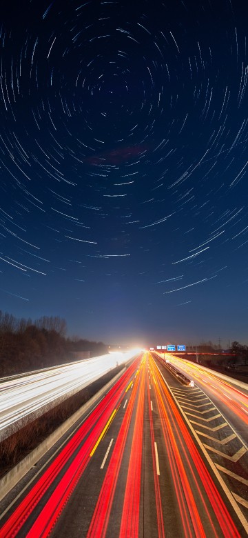 Image time lapse photography of cars on road during night time