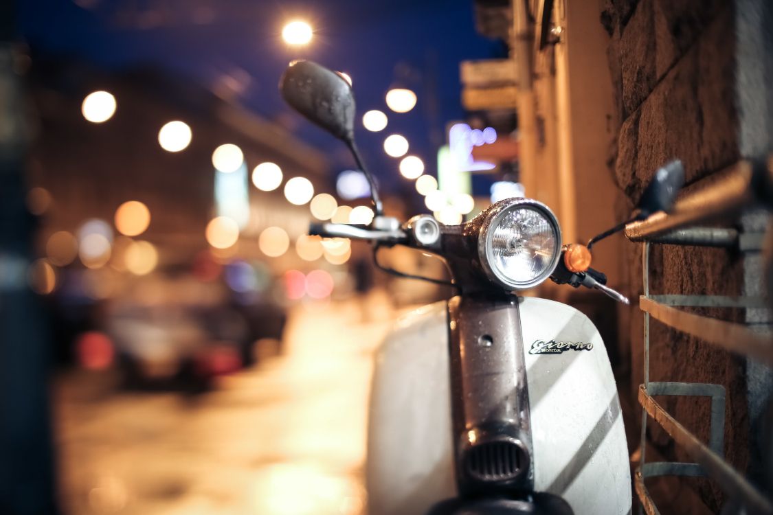 black motorcycle on road during night time