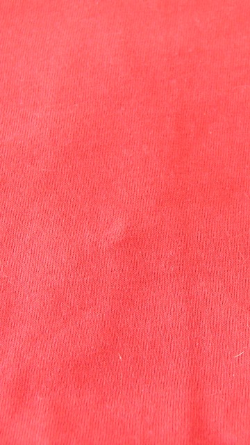 Image red textile with white hair