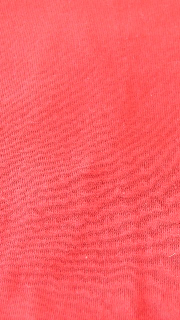 Image red textile with white hair