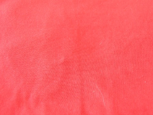 Image red textile with white hair