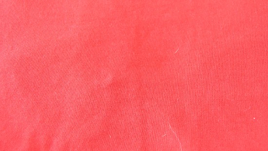 Image red textile with white hair