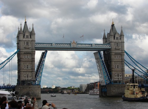 Image people walking on bridge during daytime