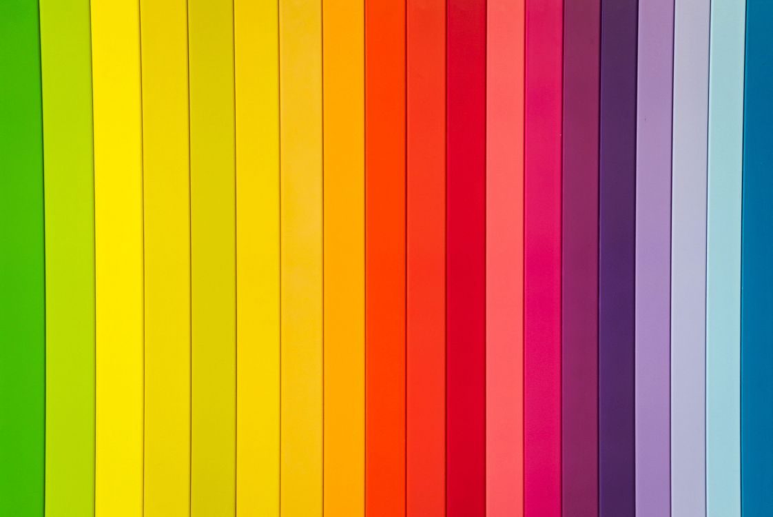 purple yellow and pink striped textile