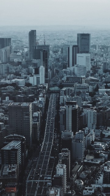Image aerial view of city buildings during daytime
