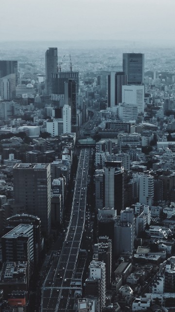 Image aerial view of city buildings during daytime
