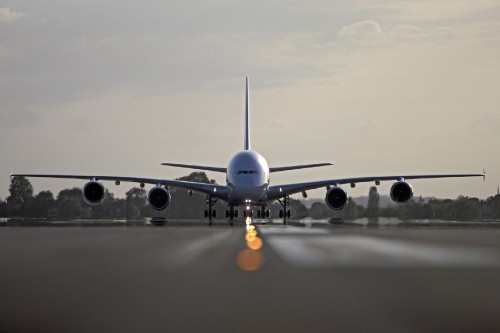 Image white passenger plane on airport during daytime