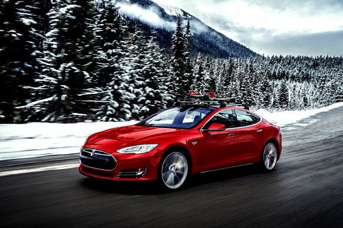 Image red porsche 911 on road near snow covered mountain during daytime