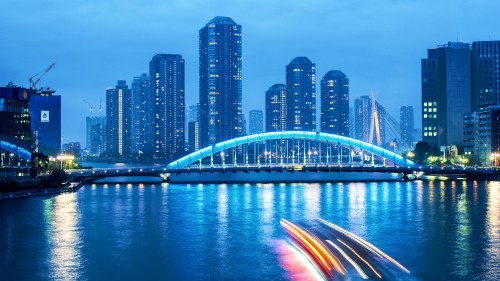 Image time lapse photography of city skyline during night time